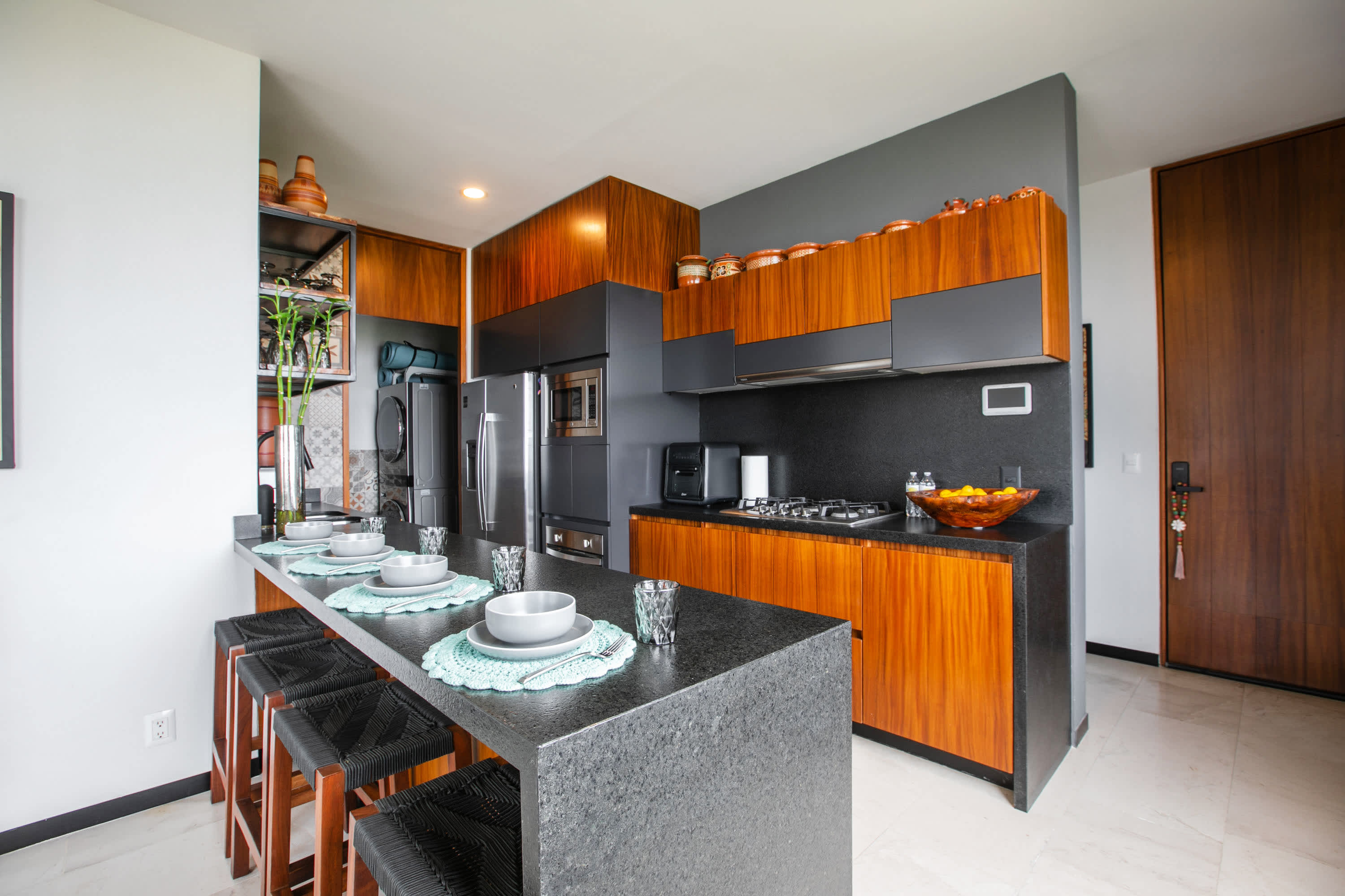 Galley kitchen with stainless steel appliances